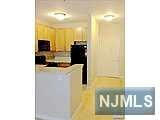 24 AVE AT PORT IMPERIAL APT 242, WEST NEW YORK, NJ 07093, photo 3 of 9